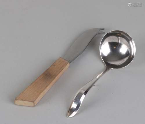 835/000 Silver cream spoon with beautifully stylized