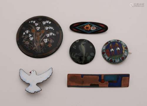 Six brooches with enamelled images. In various forms.