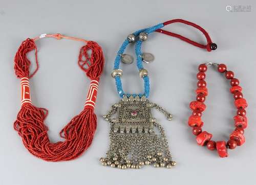 Three necklaces, one from foam coral and bamboo coral,