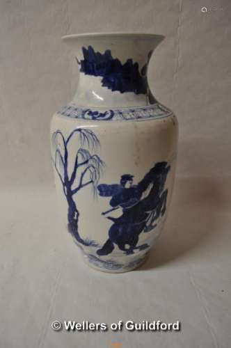 A Chinese blue and white baluster vase decorated with warriors on horseback, 29.5cm.