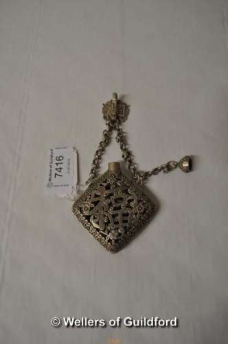 A Chinese white metal pendant smelling salts holder.