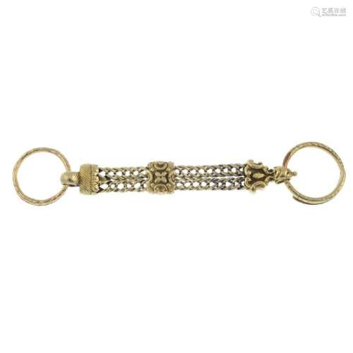 A 19th century gold fob chain. The floral engraved