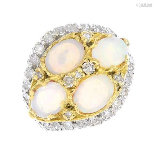 A 1970s 18ct gold opal and diamond cluster ring.