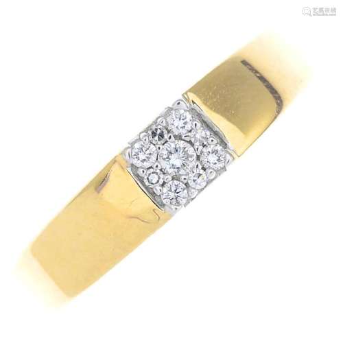 An 18ct gold diamond cluster ring. The brilliant-cut