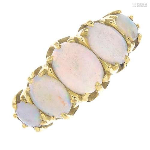 An 18ct gold opal five-stone ring. The graduated oval