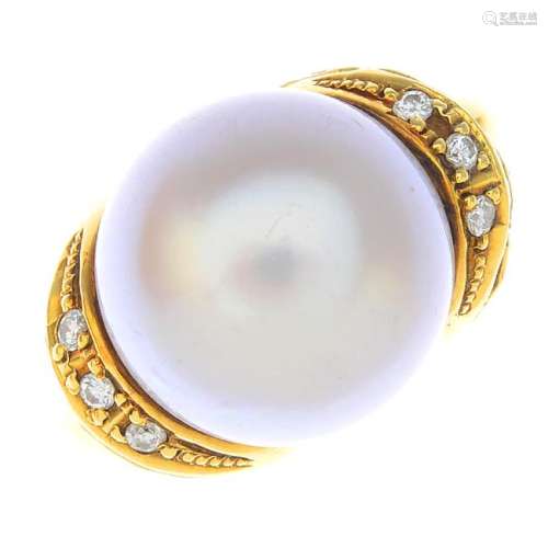 An 18ct gold cultured pearl dress ring. The cultured
