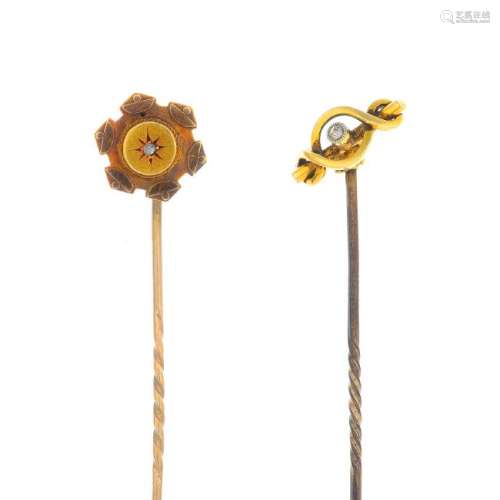 Two 15ct gold brooches and two diamond stickpins. To
