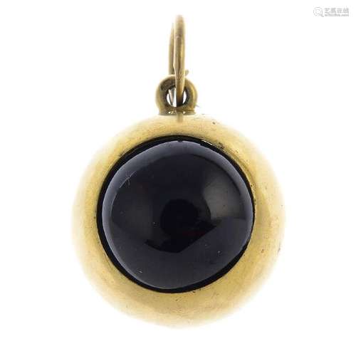 A mid Victorian gold garnet pendant. Designed as a