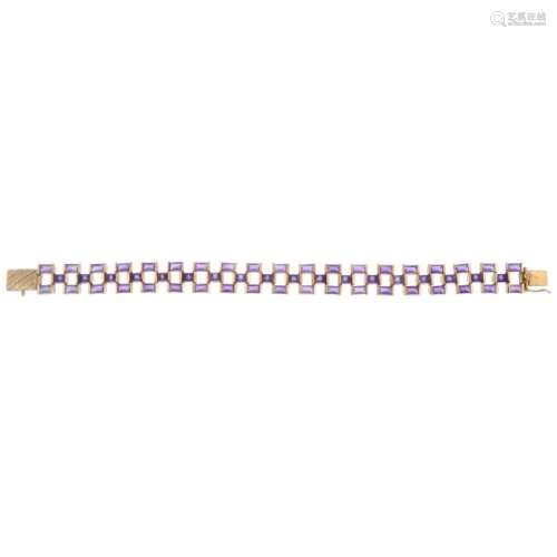 A 9ct gold amethyst bracelet. Of geometric design,