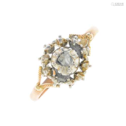 A diamond single-stone ring. The rose-cut diamond,