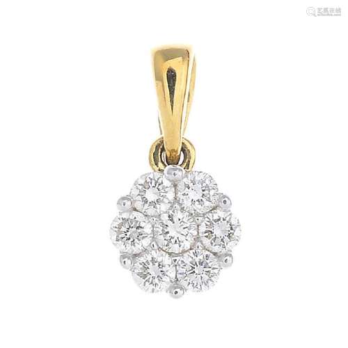 An 18ct gold diamond cluster pendant. The brilliant-cut