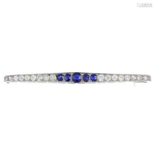 A mid 20th century platinum and 18ct gold sapphire and