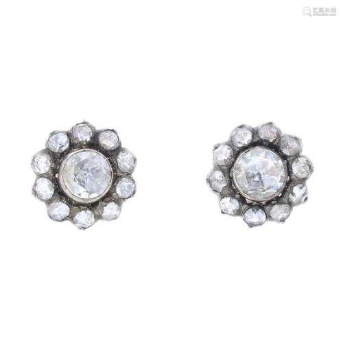 A pair of rose-cut diamond cluster earrings. Diameter