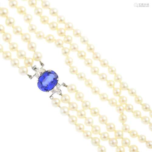 A cultured pearl three-row necklace. Comprising three