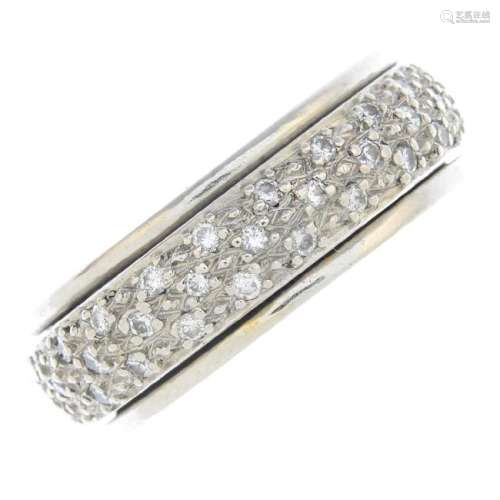 A diamond full eternity ring. Designed as a pave-set