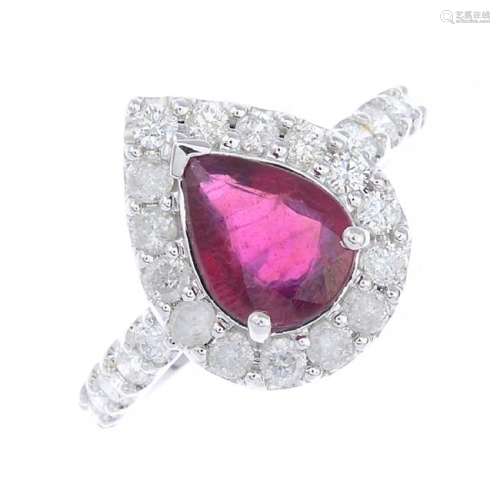 A glass-filled ruby and diamond cluster ring. The