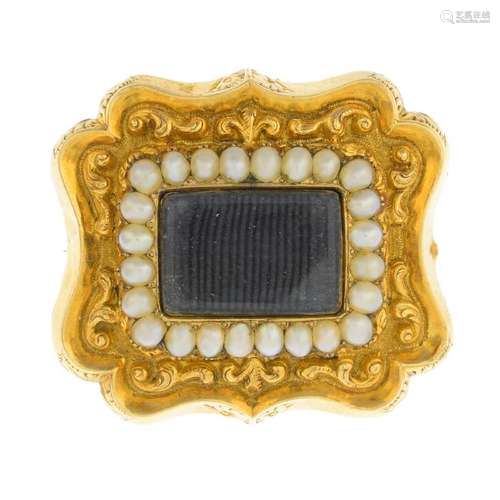 An early 19th century gold split pearl memorial brooch.