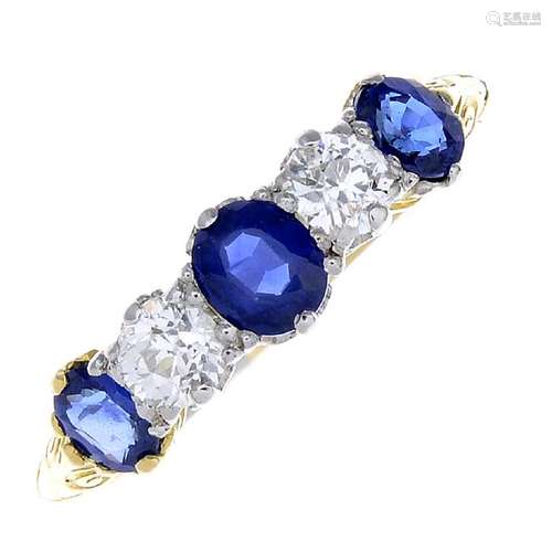 A sapphire and diamond five-stone ring. The graduated