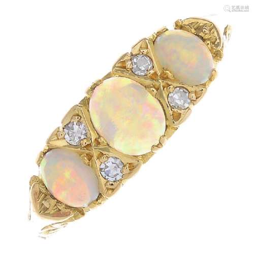 A 1970s 18ct gold opal and diamond dress ring. The