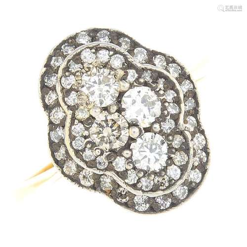 A diamond cluster ring. The brilliant-cut diamond