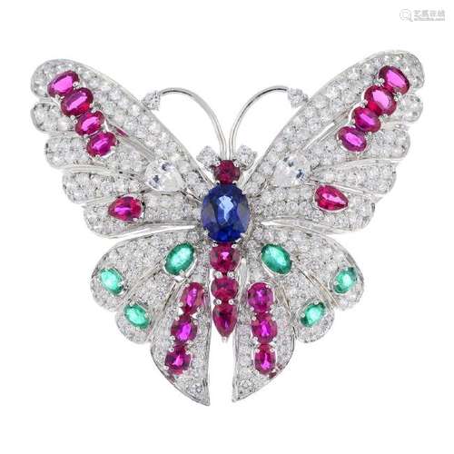 A gem-set butterfly brooch. The flying butterfly, set