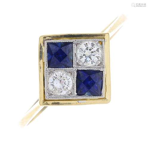 A sapphire and diamond cluster ring. Designed as a