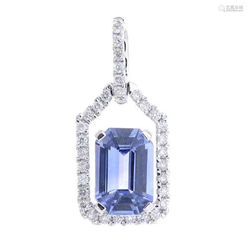 A sapphire and diamond pendant. The rectangular-shape
