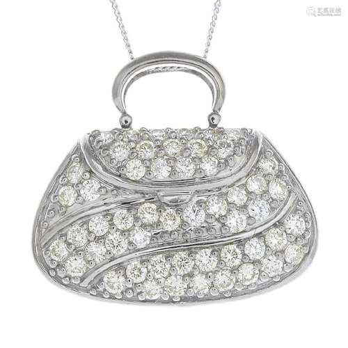 An 18ct diamond handbag pendant. Designed as a pave-set