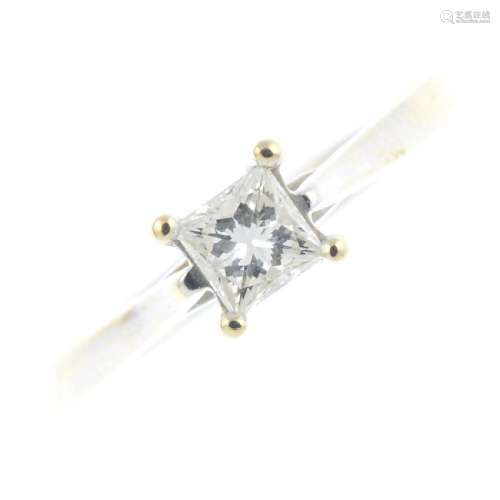 An 18ct gold diamond single-stone ring. The