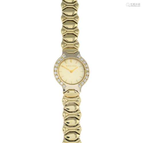 BUECHE GIROD - a lady's 9ct gold diamond watch. The