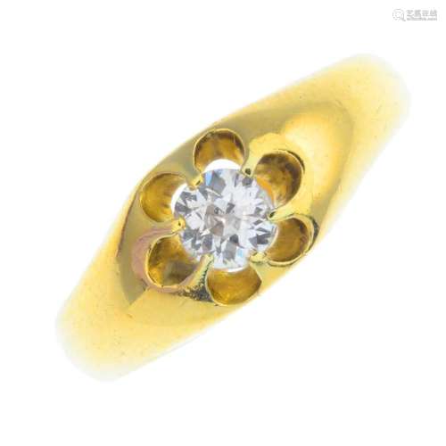 A diamond single-stone ring. The old-cut diamond,