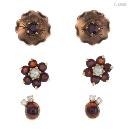 Three pairs of garnet and gem-set earrings. To include