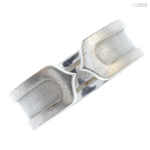 CARTIER - a 'C de Cartier' ring. Designed as an