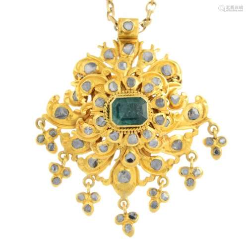 An emerald and diamond pendant. The rectangular-shape