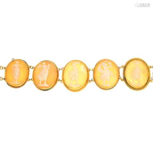 A cameo bracelet. Designed as a series of oval shape