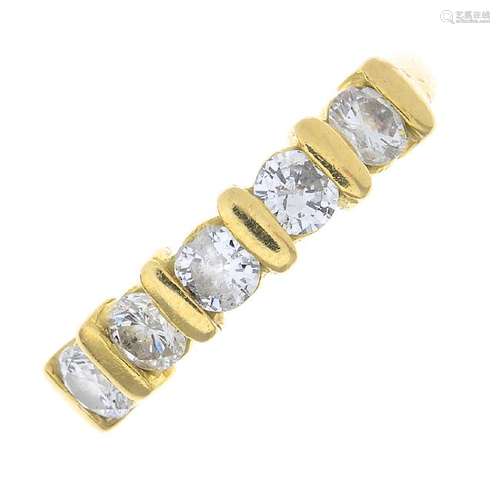 An 18ct gold diamond five-stone ring. Designed as a