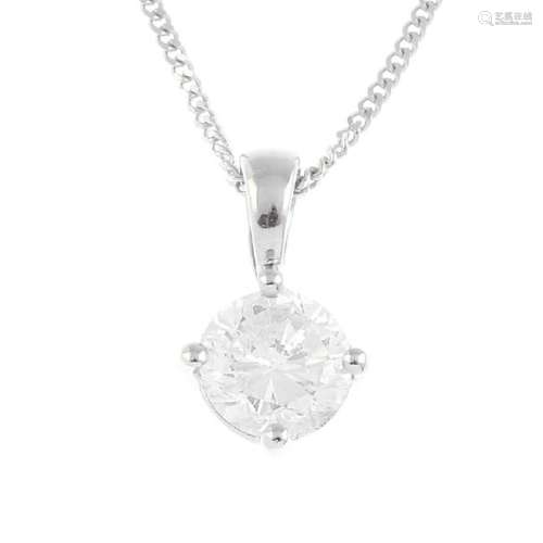An 18ct gold diamond single-stone pendant. The
