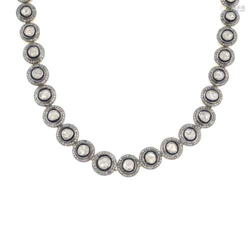 A diamond necklace. Designed as a slightly graduated