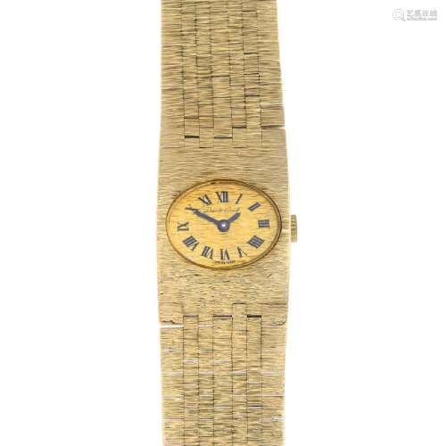 BUECHE GIROD - a lady's 9ct gold wrist watch. Of oval