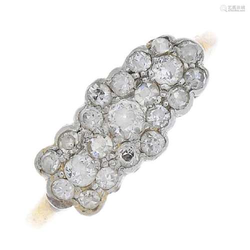 An mid 20th Century gold diamond cluster ring. Designed