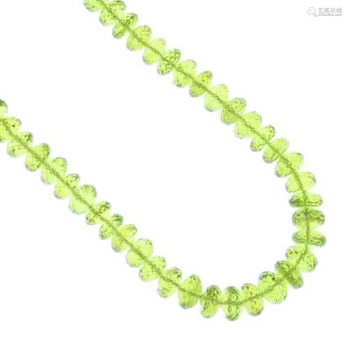 A peridot necklace. Designed as a single-row of faceted