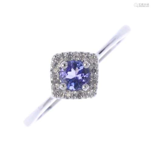 A 9ct gold diamond and tanzanite ring. The