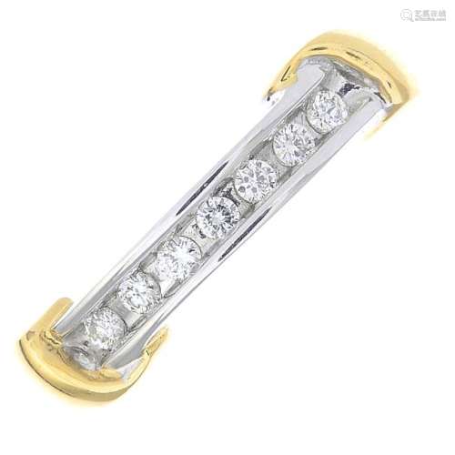 An 18ct gold diamond half eternity ring. Of bi-colour