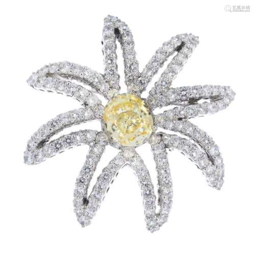 A cubic zirconia floral brooch. Of openwork design, the