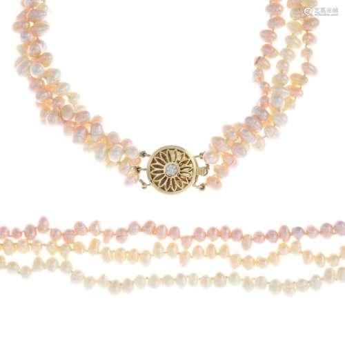 A cultured pearl three-row necklace with matching