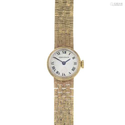 JAEGER LE COULTRE - a lady's 9ct gold wrist watch. Of