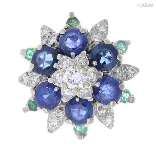A sapphire, emerald and diamond dress ring. The