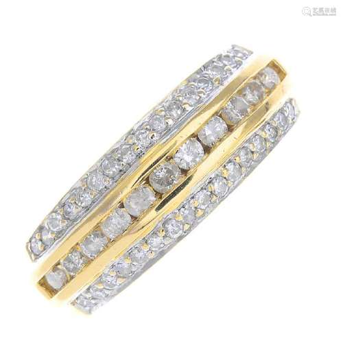 An 18ct gold diamond band ring. Designed as a