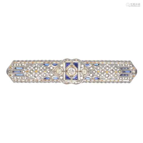 A diamond and sapphire panel brooch. Of geometric