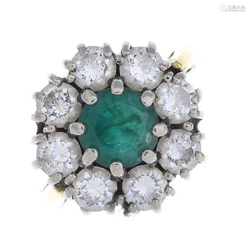 (53726) An 18ct gold diamond and emerald cluster ring.